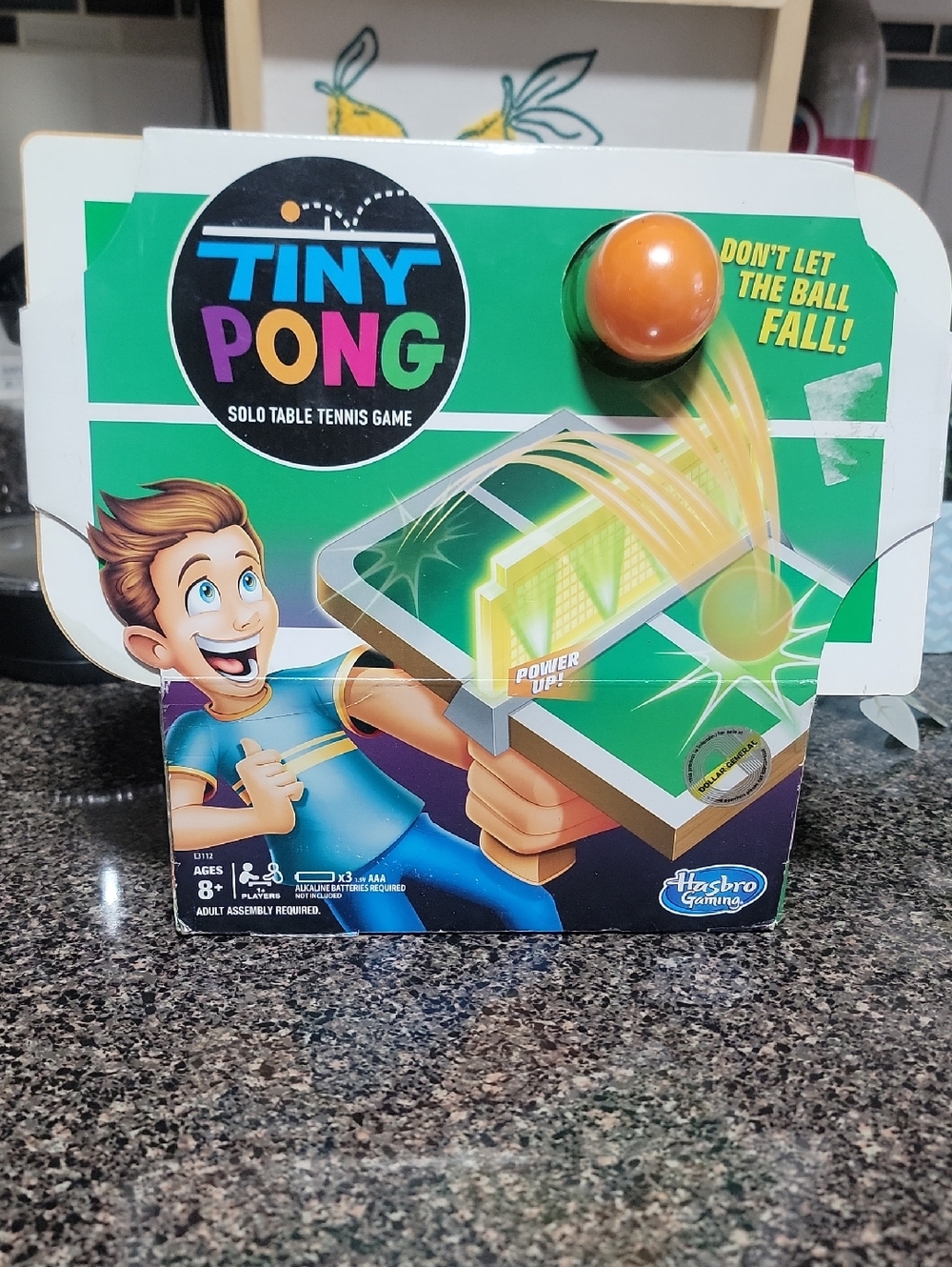 Tiny Pong Solo Table Tennis Game - Green Packaging with Orange Ball